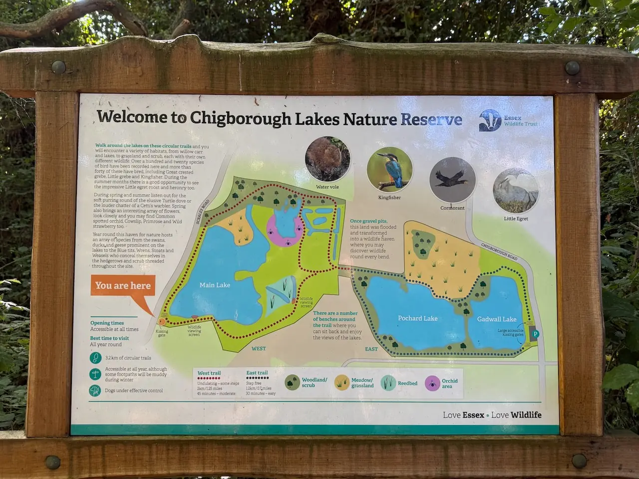 The Essex Wildlife Trust welcome board and trail map at the entrance