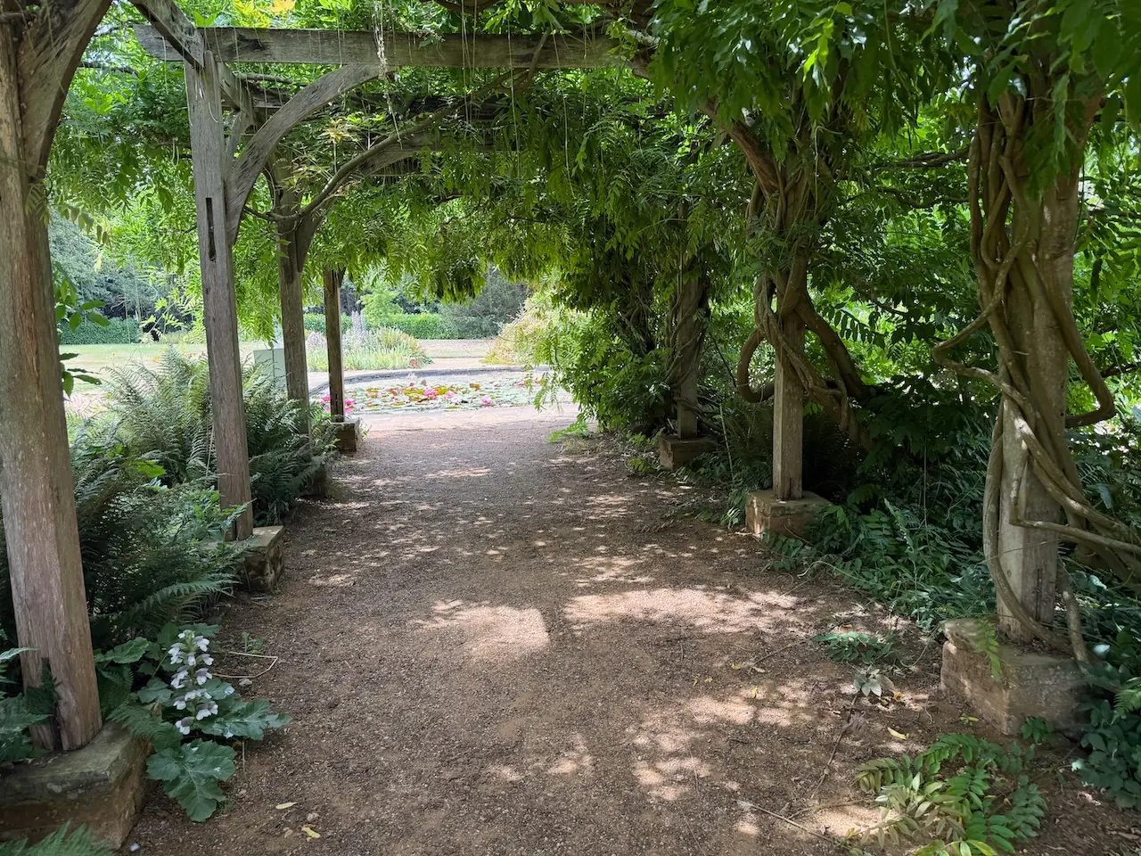 Pleasure Gardens trellis and pond